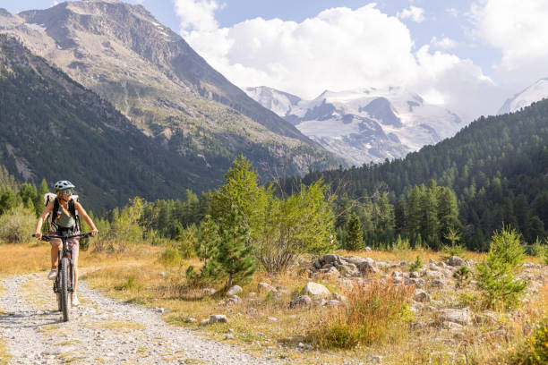 istock Cyclist Riding Along Scenic Mountain Trail 2172636012