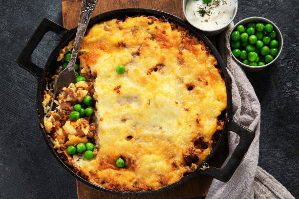 istock Shepherds Pie - ground meat with vegetables, topped with mashed potatoes, and cheese. Baked. 2172639741