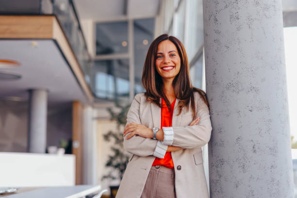 istock Smiling businesswoman posing in modern office 2172654293