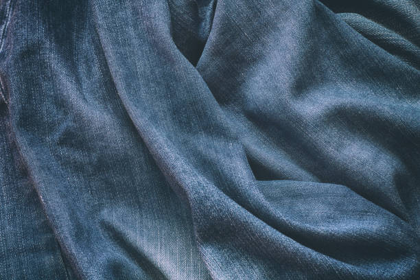 istock A background of blue crumpled denim jeans 2172663274