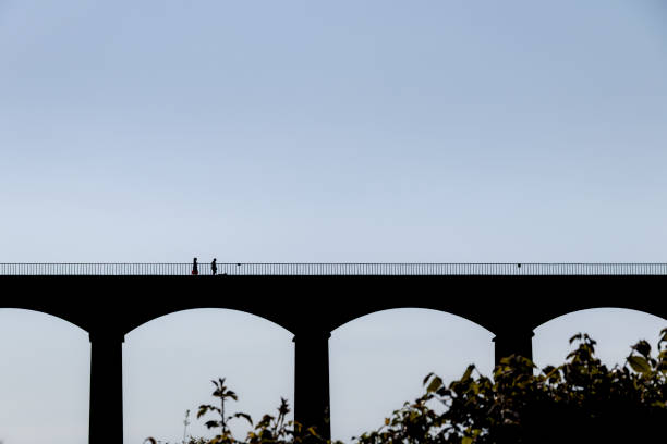 View of Pontcysyllte Aqueduct Llangollen, UK,  People can be seen walking over the aqueduct.