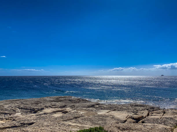 istock Seascape with blue sea over blue sky 2172665797