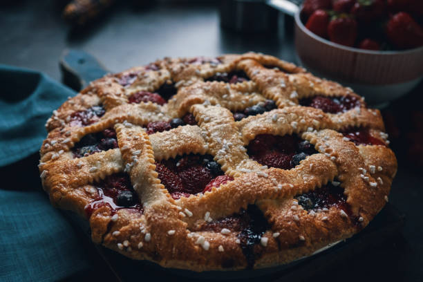 istock Preparing Berry Pie in Domestic Kitchen 2172670593