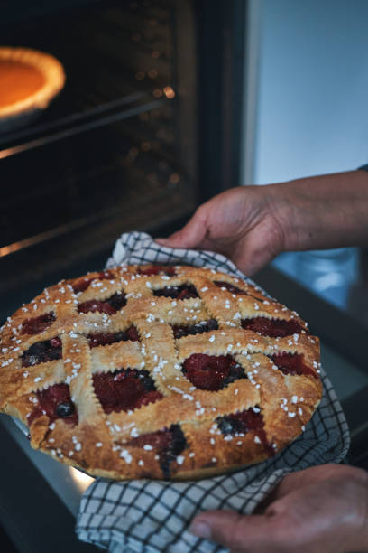 istock Preparing Berry Pie in Domestic Kitchen 2172671388