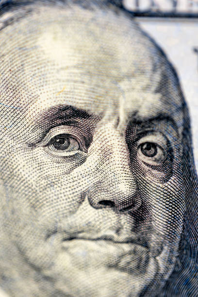 istock Close-up image of Benjamin Franklin on 100 bill. Finance concept. 2172675523
