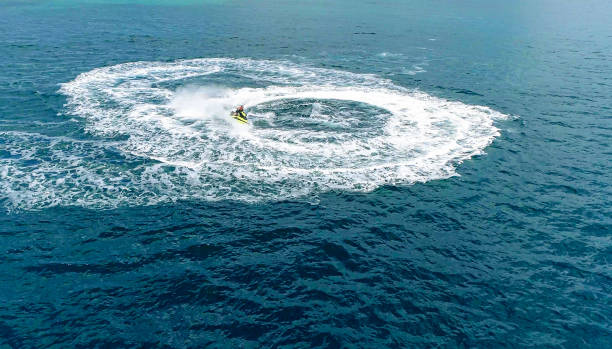 Circular jet ski on the water surface. Top view from drone Stock Image