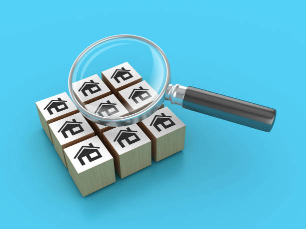 istock House Blocks with Magnifying Glass 2172680724