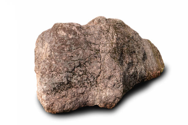 istock Ancient great stone with uneven relief surface with cracks illuminated by natural sunlight on white isolated background 2172685288