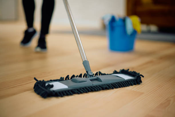 istock Close up of woman using a mop while cleaning the floor. 2172691206