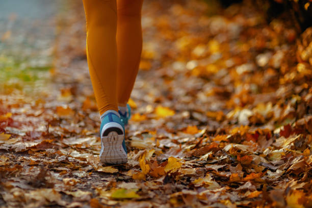 istock Closeup on woman in park walking 2172691214