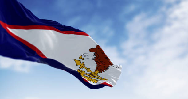 istock The American Samoa flag in the wind on a clear day 2172703940