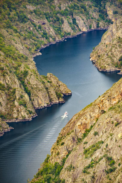Boat trip on the Sil River. Sil Canyon in Ribeira Sacra, Galicia Spain. View from Balcon de Madrid lookout. Tourist attraction.