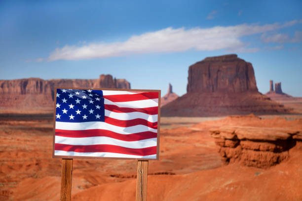USA Utah  Monument Valley. The Navajo Tribal park. sign with american flag