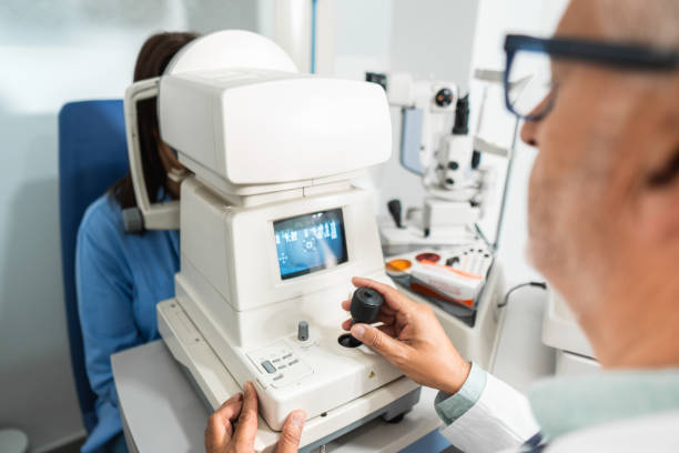 istock Senior optometrist using medical technology examining patient eyesight 2172714942