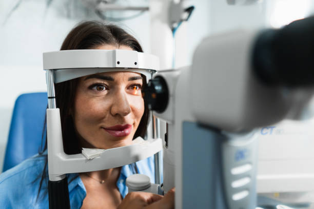 istock Young woman undergoing eye examination using medical equipment 2172714977