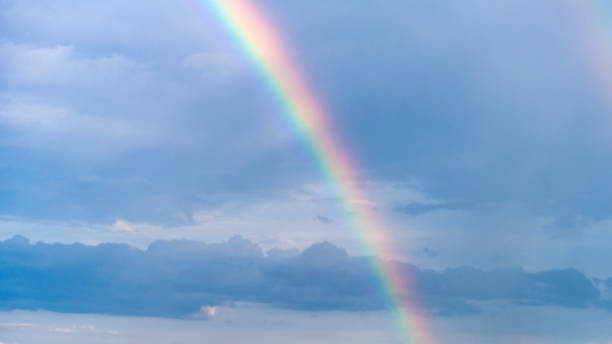 istock Blue sky with beautiful rainbow over the clouds 2172720194