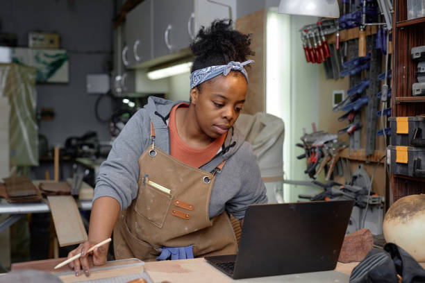 istock Engaging in Woodworking in Cozy Workshop 2172724721