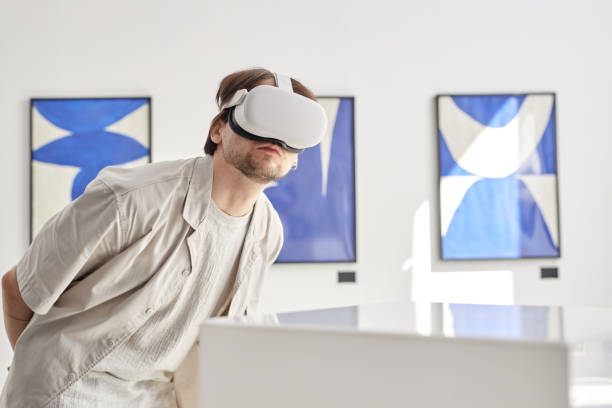 istock Man Looking at Digital Art 2172727044