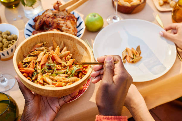 istock Sharing Delicious Pasta Salad During Outdoor Meal 2172727708
