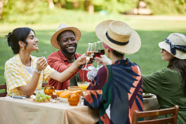 istock Celebrating Outdoors with Friends at Picnic Table 2172727833