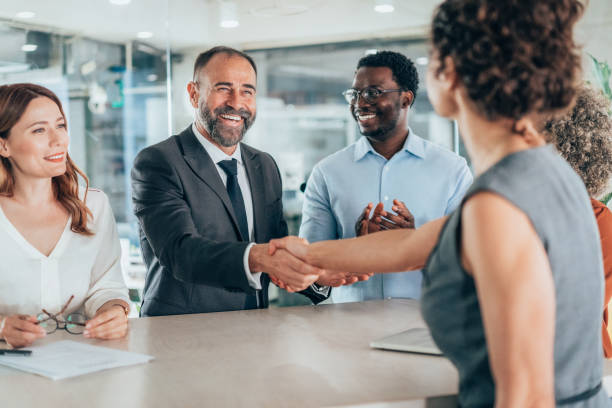 istock Shaking hands with new colleague 2172730902