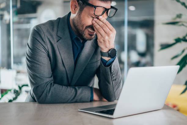istock Businessman with headache 2172730933