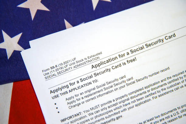 istock Application for Social Security Card with form on USA flag, background 2172731654