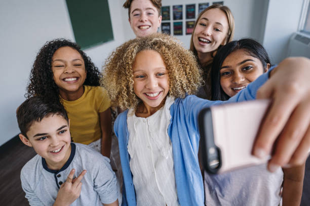 istock Group of middle school students take a selfie 2172737003