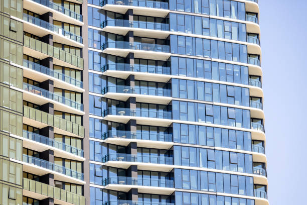 Modern apartment building against blue sky, background with copy space, full frame horizontal composition, Broadbeach, Gold Coast Queensland