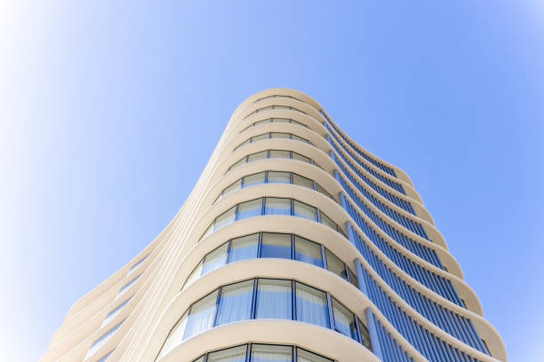 Modern apartment building against blue sky, background with copy space, full frame horizontal composition, Broadbeach, Gold Coast Queensland