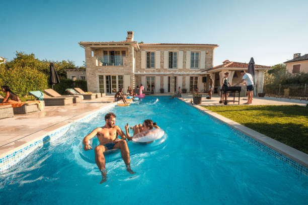 istock Swimming Fun at a Villa Pool Party 2172740122
