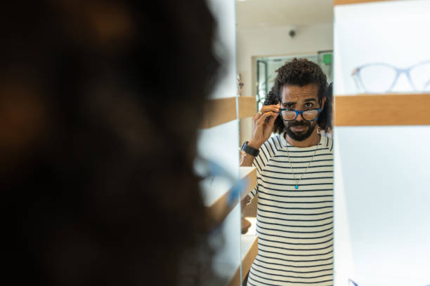 istock Purchase of eyeglass frames and glasses from an optician. 2172740435