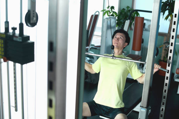 istock Young Asian man doing machine training (lat pulldown) at the gym 2172742756