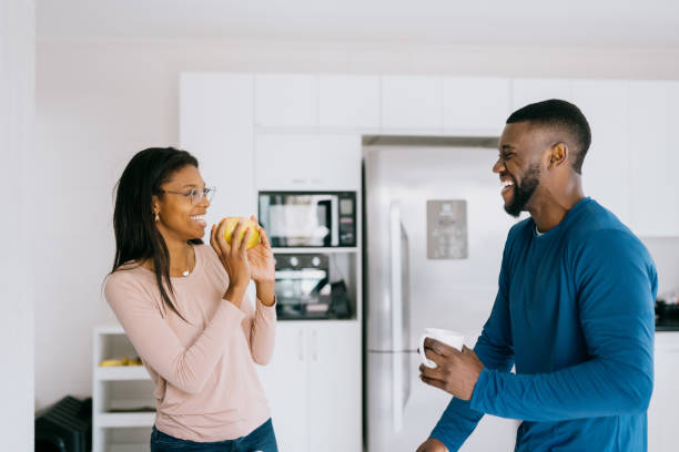 istock Young couple having fun in the kitchen 2172747650