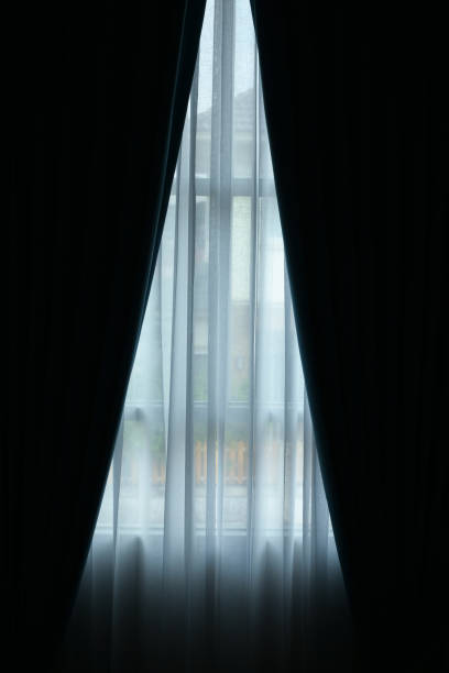 istock black and white curtain on the window in home, interior design 2172748019