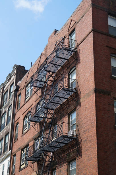 istock ancient brick building with fire ladder on the wall 2172750411