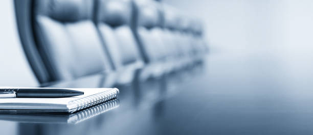 istock Notepad on a table with pen before meeting, blue tone, business concept with copy space 2172751513