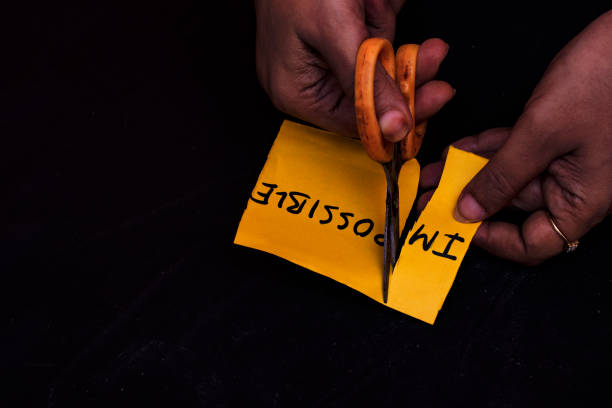 istock Woman Changing Impossible to I'm Possible on Yellow Note for Motivation Concept 2172755301