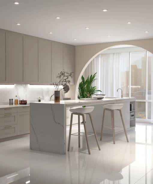 istock White marble kitchen island in modern, luxury kitchen with beige built in cabinet, cupboard in sunlight from arch window to cityscape view for interior design decoration, product background 3D 2172756542
