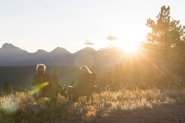 istock Mature couple watch sunset over mountains 2172759149