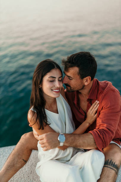 istock Kissing over a sea 2172768520