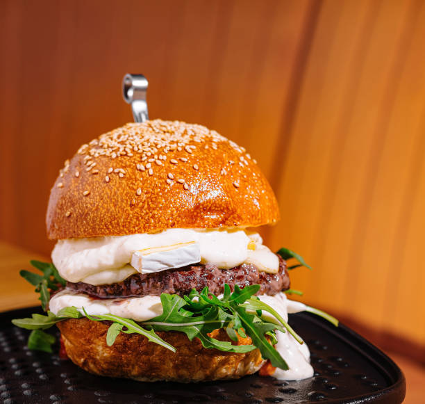 istock Gourmet beef burger with fresh toppings 2172772389