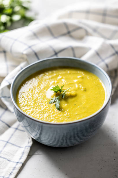 istock Healthy creamy vegetable soup in a blue bowl. 2172772856