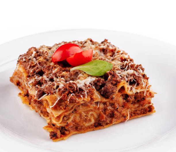 istock Portion of lasagna sitting on a white plate 2172774112
