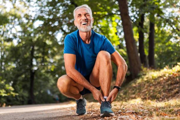 istock Ankle Pain Interrupts Outdoor Exercise for Mature Man 2172778506