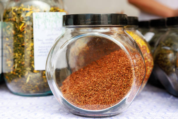 istock A jar sits on table next to other jars, loose tea 2172778982
