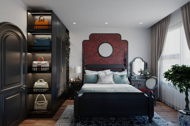 istock Modern Design Featuring Stylish a bedroom with a black bed, a red headboard, and a decorative mirror. 2172781965