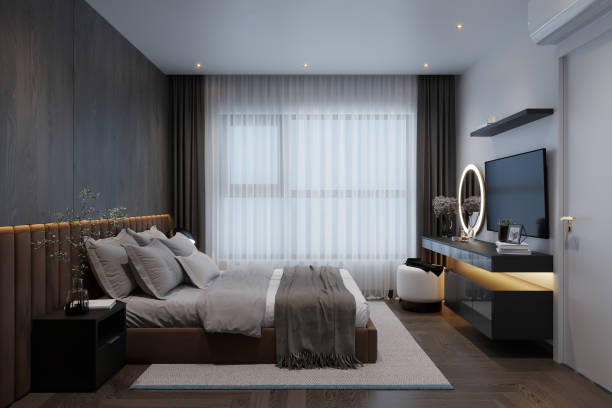 istock A minimal bedroom design featuring a double-sized bed and elegant gray curtains adorning the windows. 2172782452