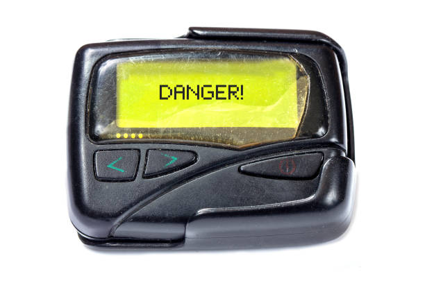 istock Old pager on a white background. Text Danger on the screen 2172782470
