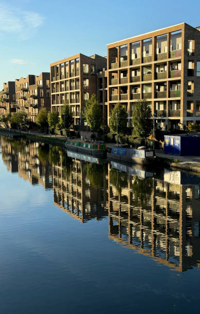 istock Modern canalside flats in West London reflected in the water 2172787788
